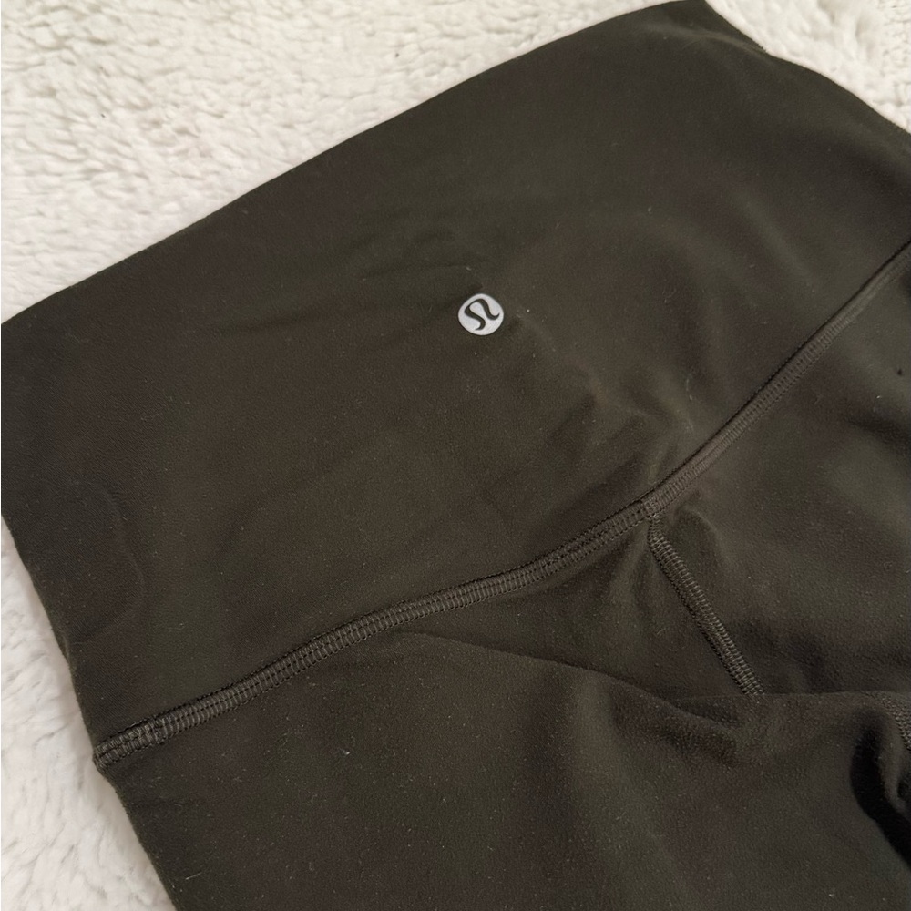 dark green lululemon leggings size 4 and 25”
